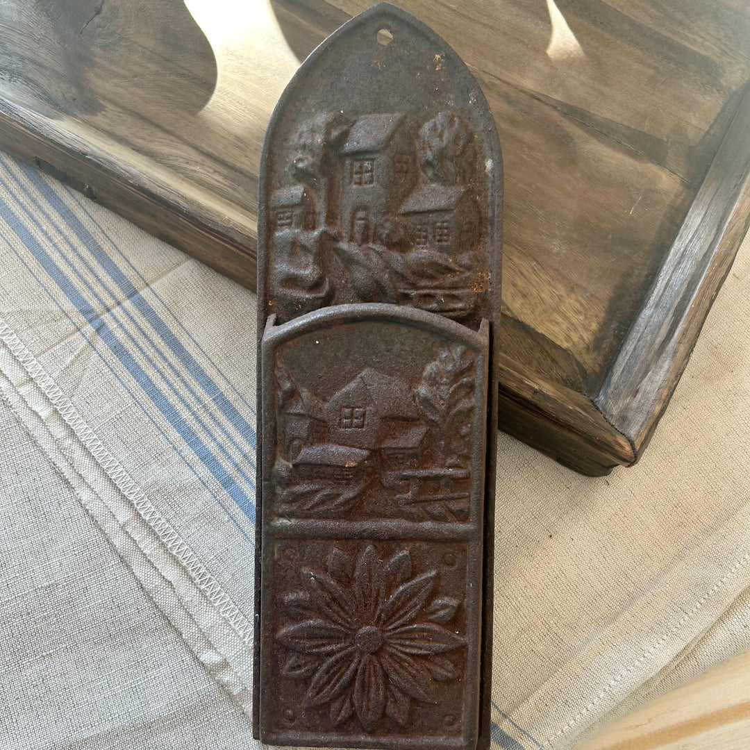 Antique cast iron wall mounted match holder