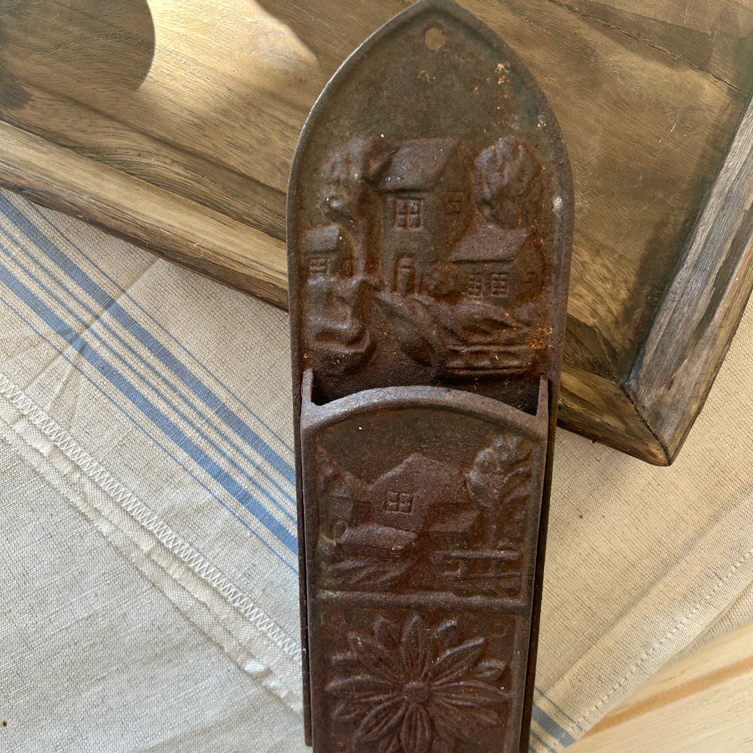 Antique cast iron wall mounted match holder