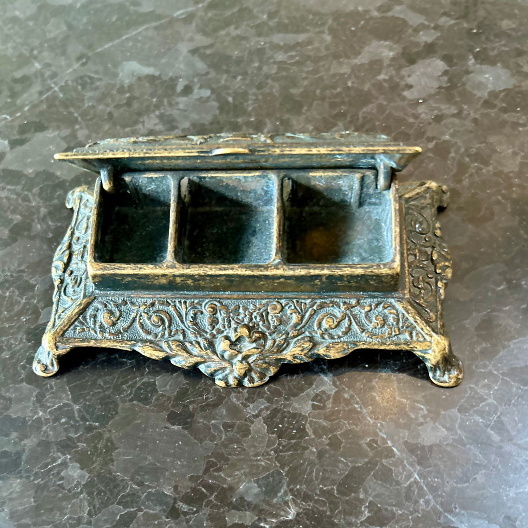 Victorian cast metal stamp holder