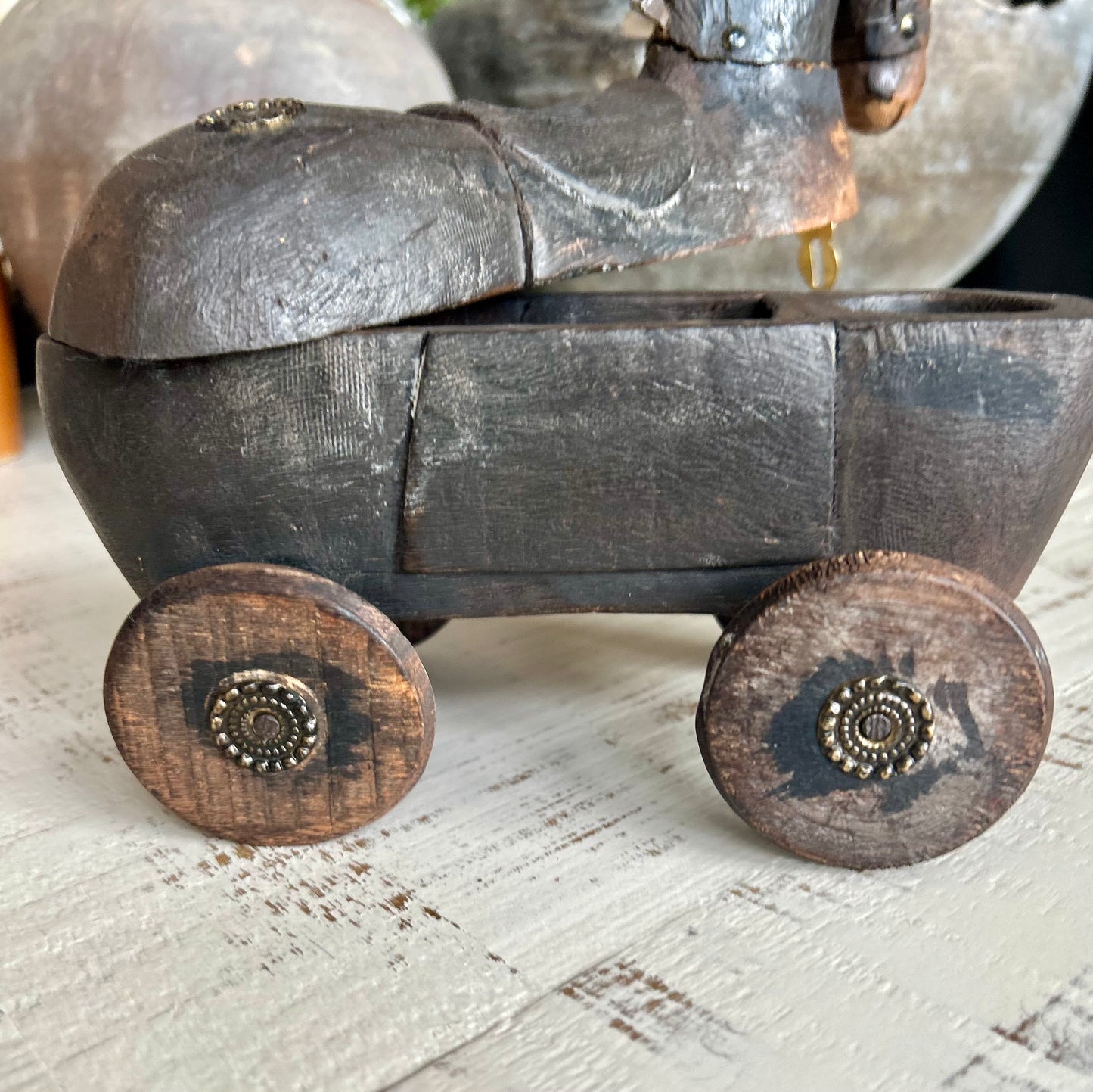 Antique folk art wooden horse on wheels