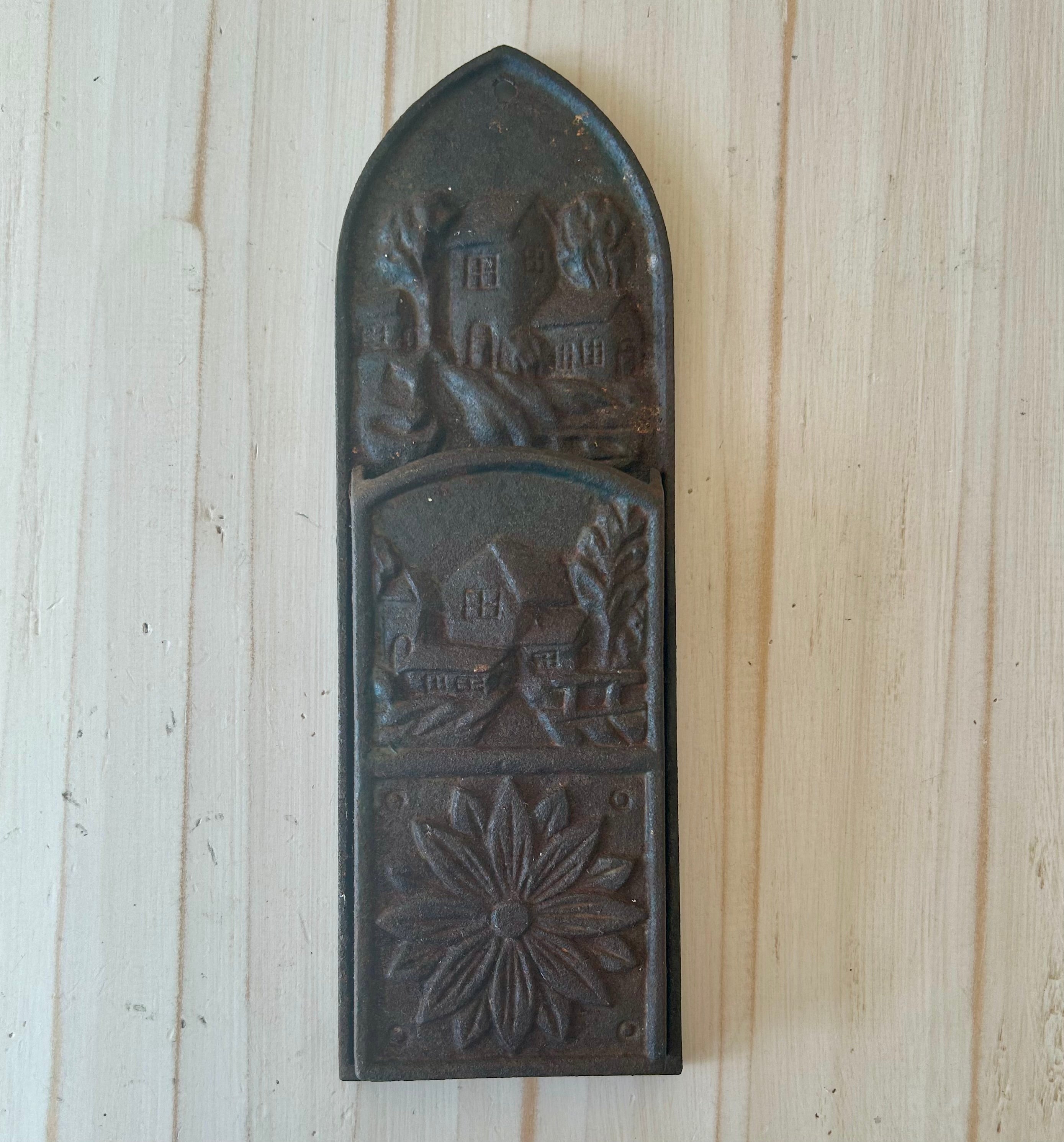 Antique cast iron wall mounted match holder