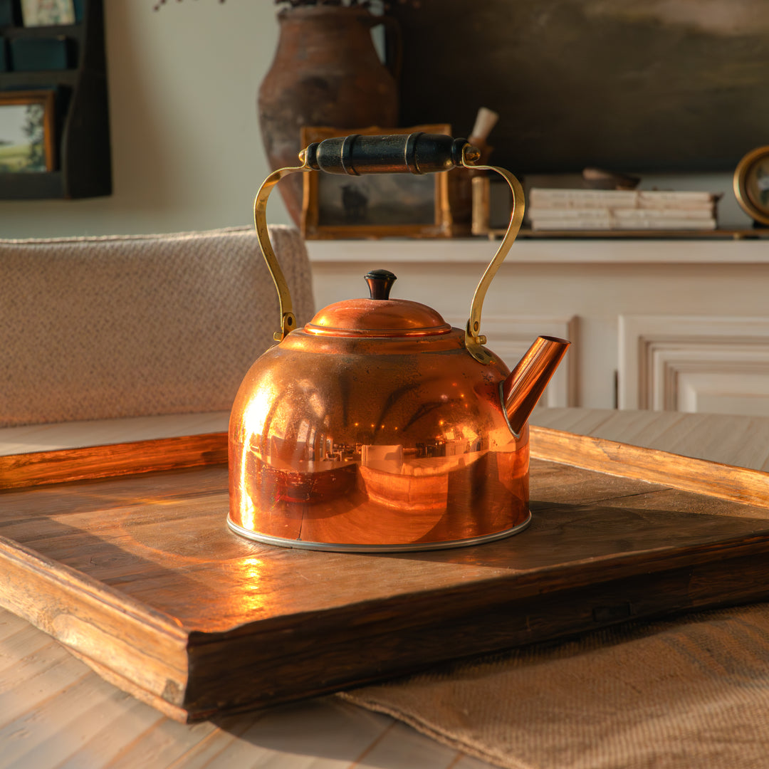 Vintage copper tea kettle with wooden handle