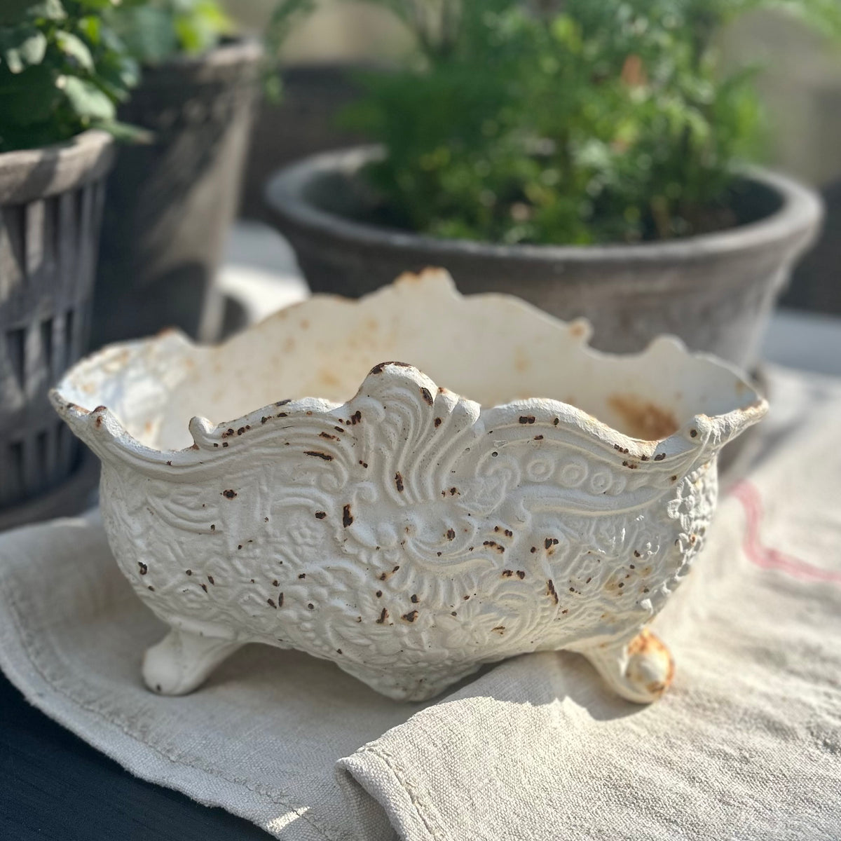 cast iron jardinière, circa 1940s–1960s