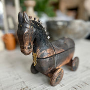 Antique folk art wooden horse on wheels