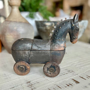 Antique folk art wooden horse on wheels