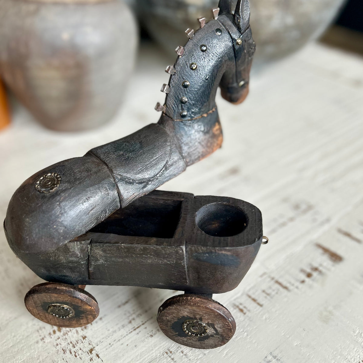 Antique folk art wooden horse on wheels