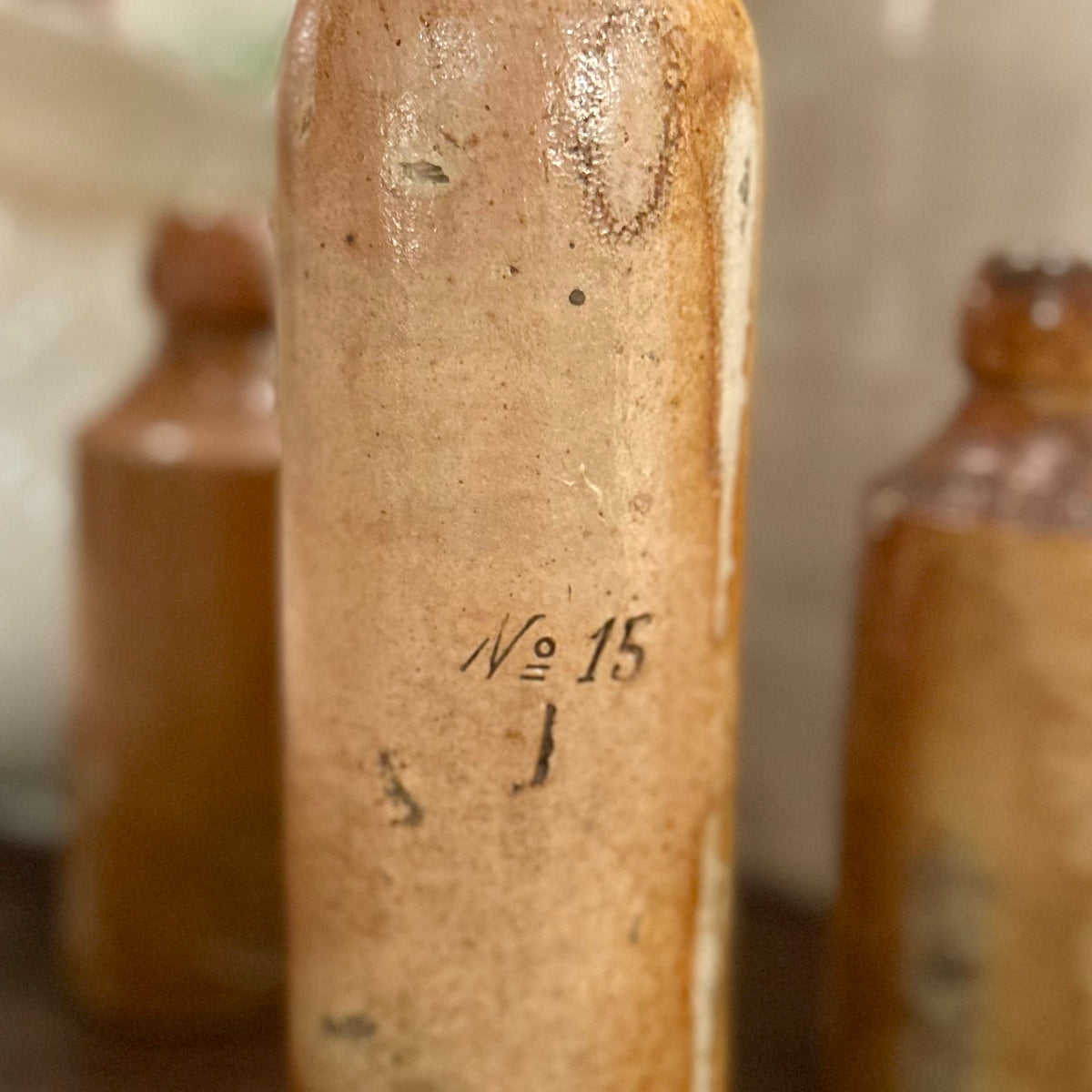 Antique Stoneware Bottle with Merchant's mark