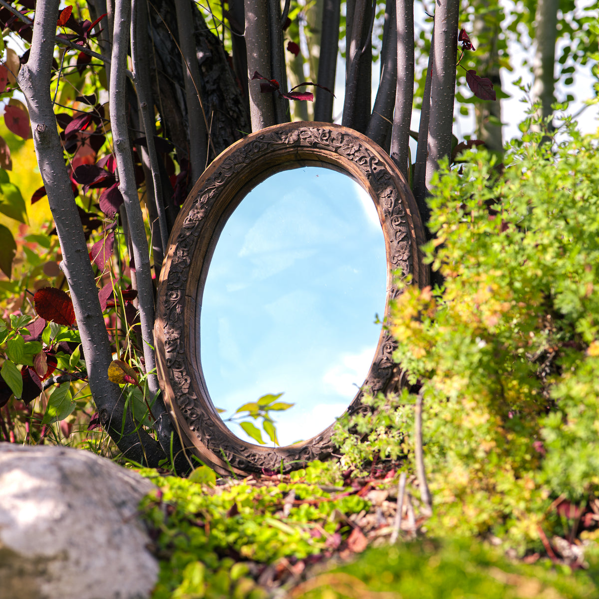 Antique mirror with hand carved wooden frame