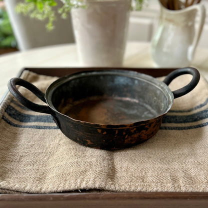 Hand-hammered antique French copper cookware with forged iron handles. (c. 1880-1920)