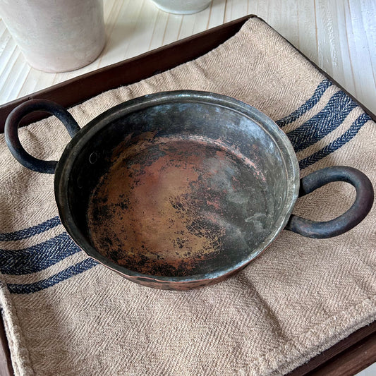 Hand-hammered antique French copper cookware with forged iron handles. (c. 1880-1920)