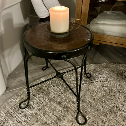 Vintage wrought-iron and leather footstool