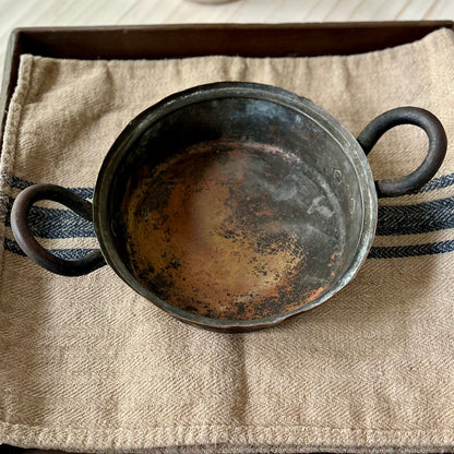 Hand-hammered antique French copper cookware with forged iron handles. (c. 1880-1920)
