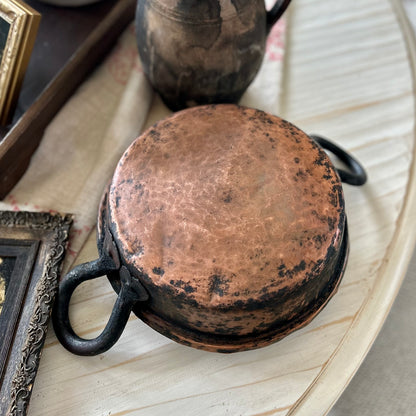 Hand-hammered antique French copper cookware with forged iron handles. (c. 1880-1920)