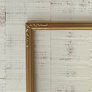 Vintage gilt frame with ornate corners