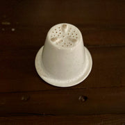 Vintage porcelain tea strainer