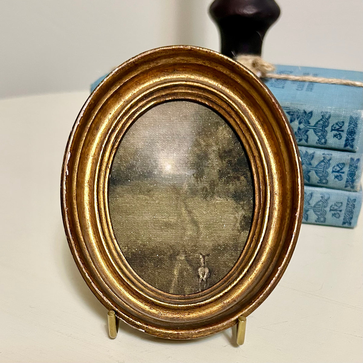 Towards the light-  in antique gilt frame