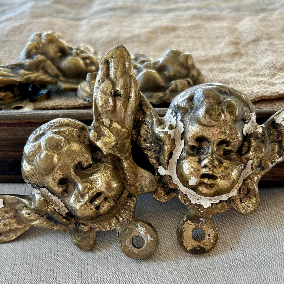 Antique gilt brass cherub appliqués (set of 5)