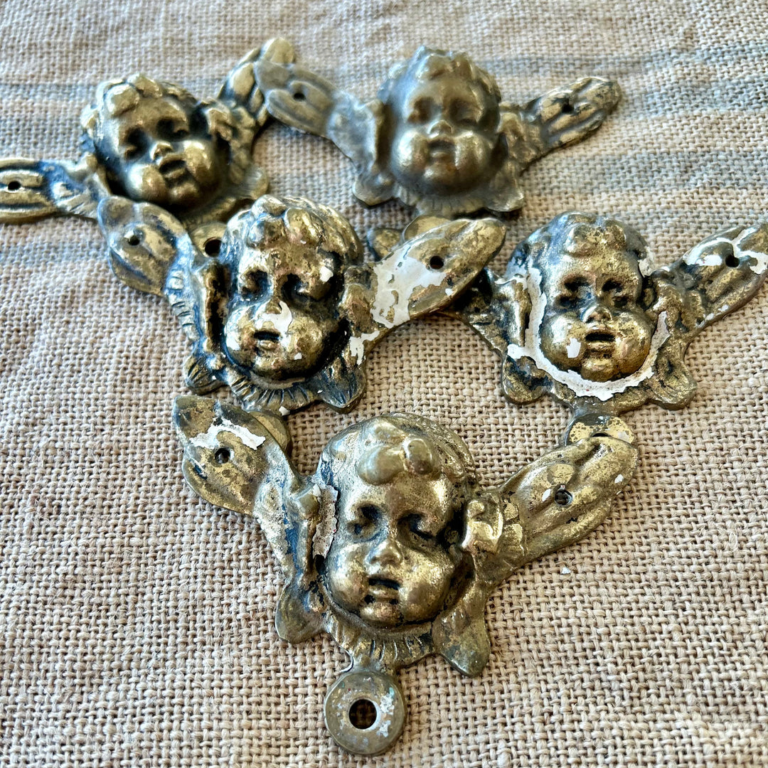Antique gilt brass cherub appliqués (set of 5)