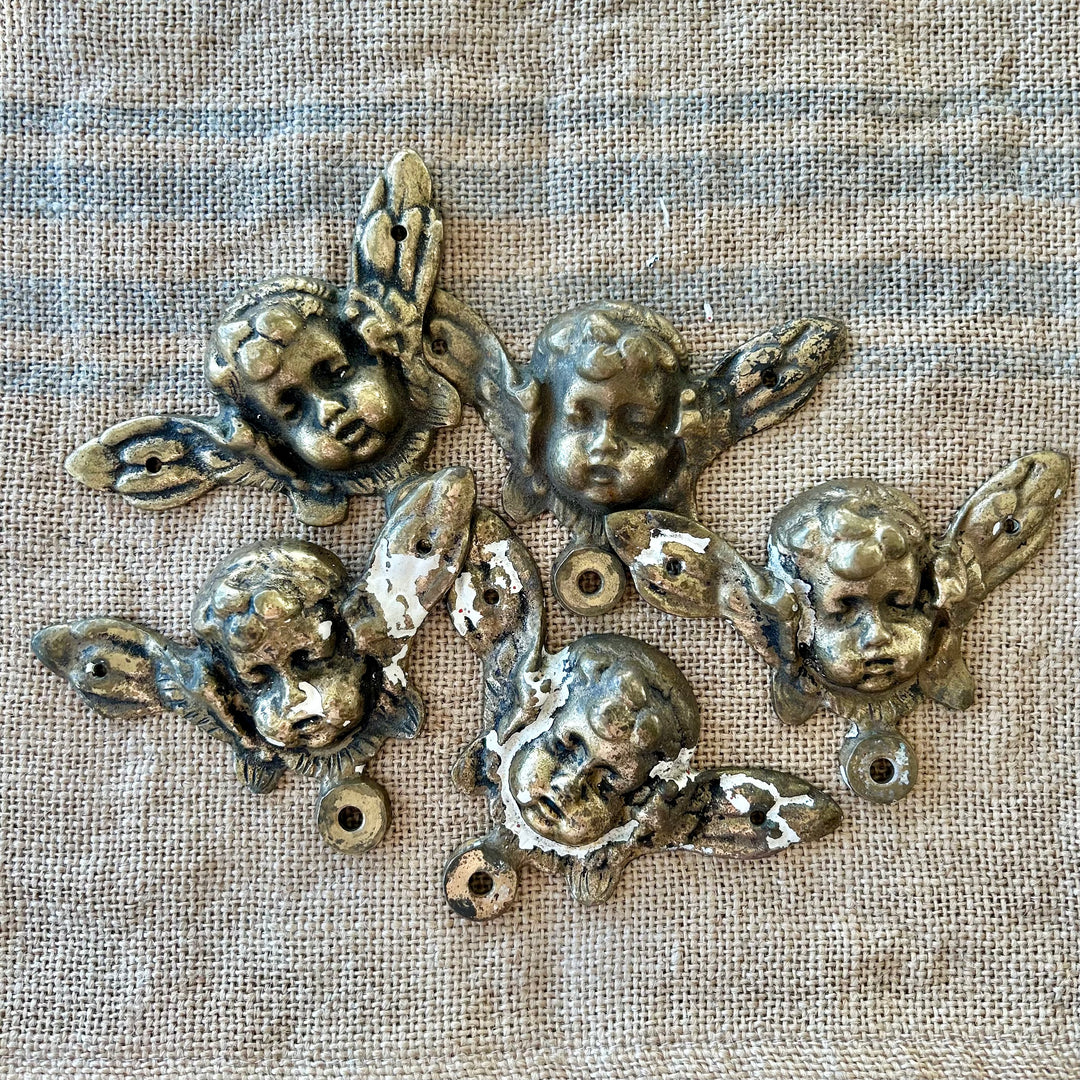 Antique gilt brass cherub appliqués (set of 5)