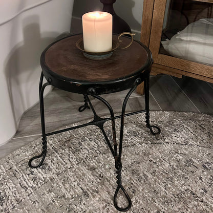 Vintage wrought-iron and leather footstool