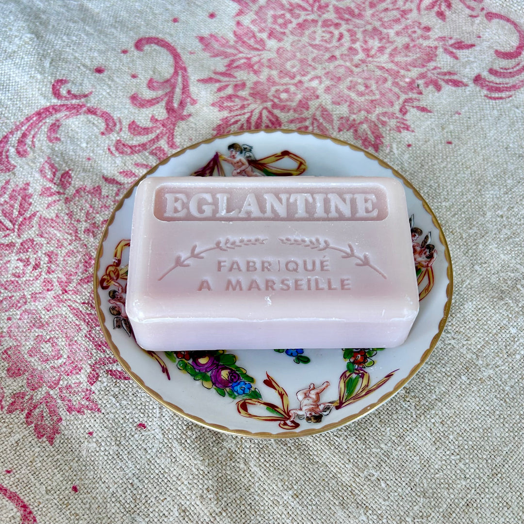 Petite French Porcelain Dish with Raised Cherubs and Floral Garland