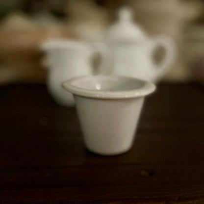Vintage porcelain tea strainer