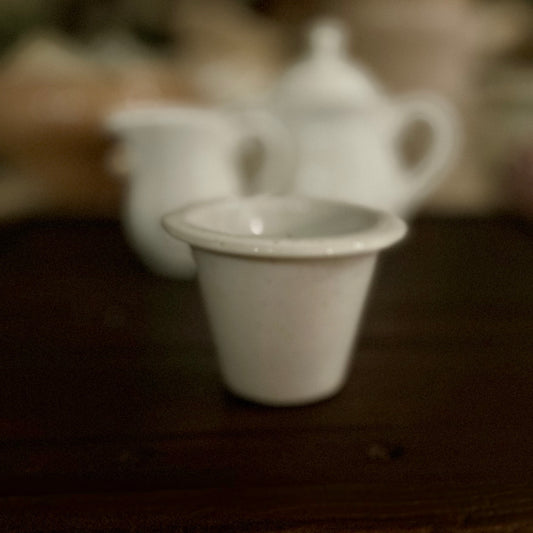 Vintage porcelain tea strainer