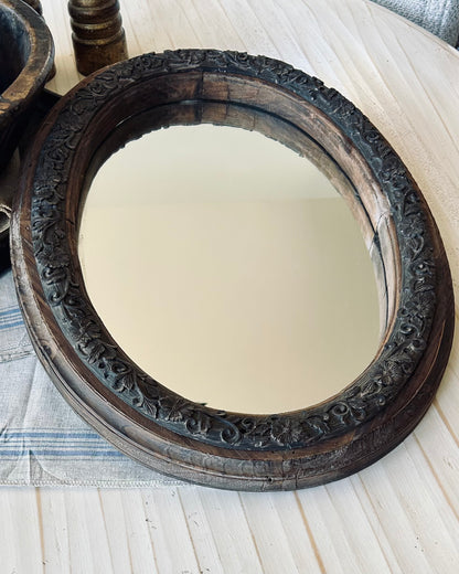 Antique mirror with hand carved wooden frame