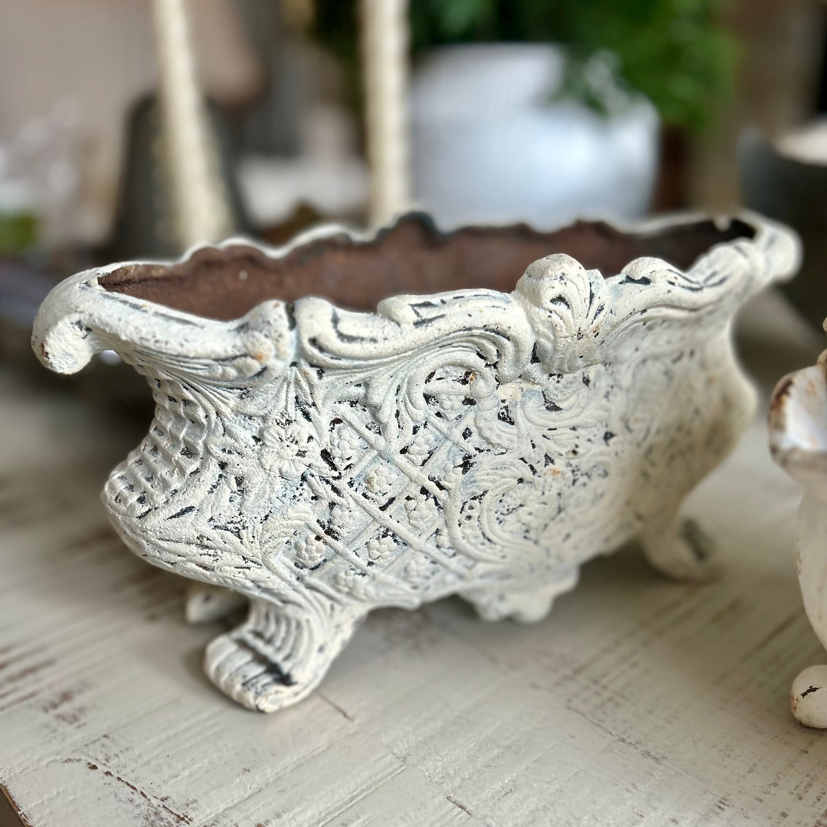 cast iron jardinière, circa 1940s–1960s