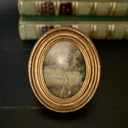 Towards the light-  in antique gilt frame