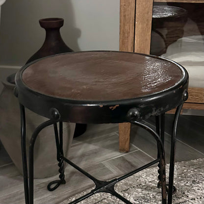 Vintage wrought-iron and leather footstool