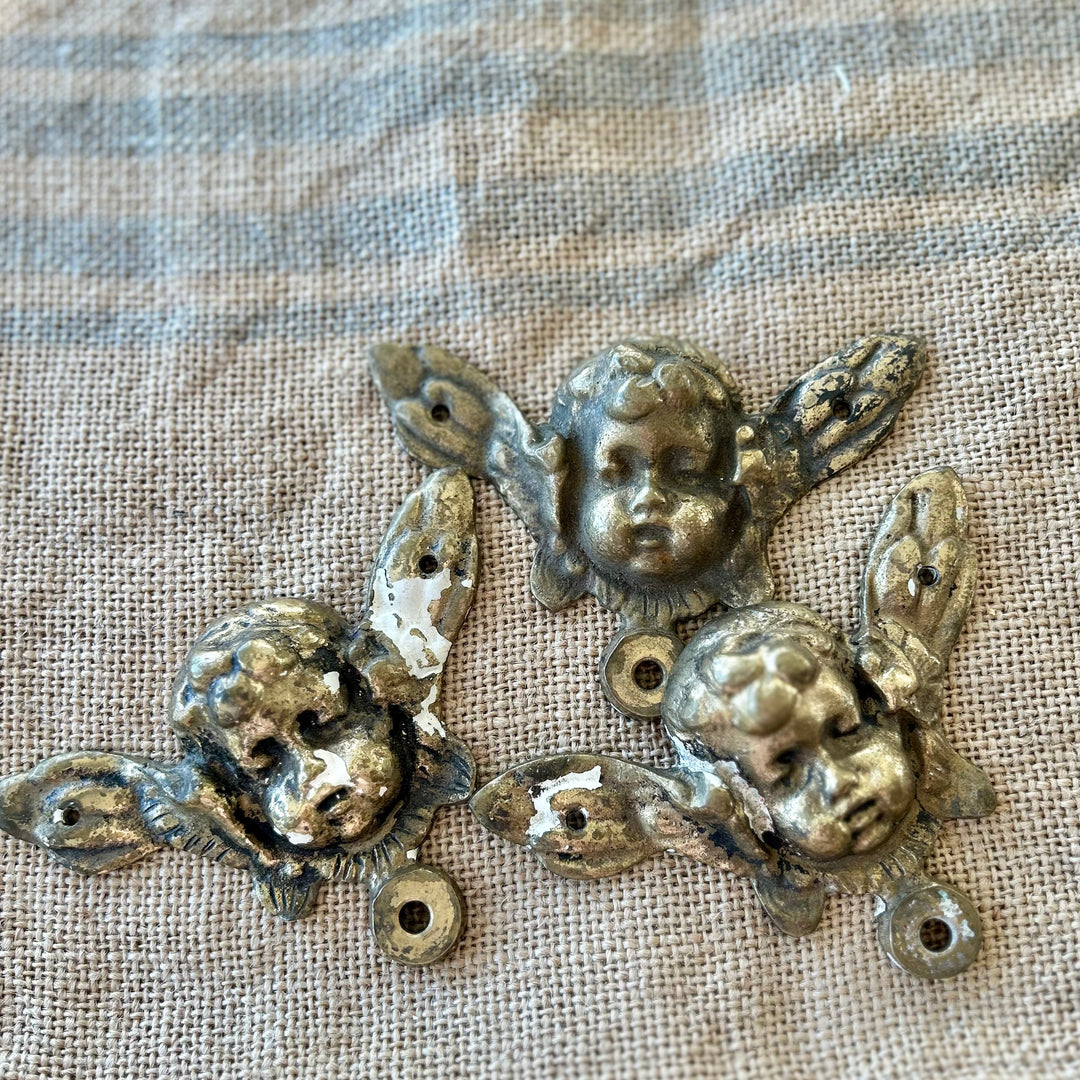 Antique gilt brass cherub appliqués (set of 5)