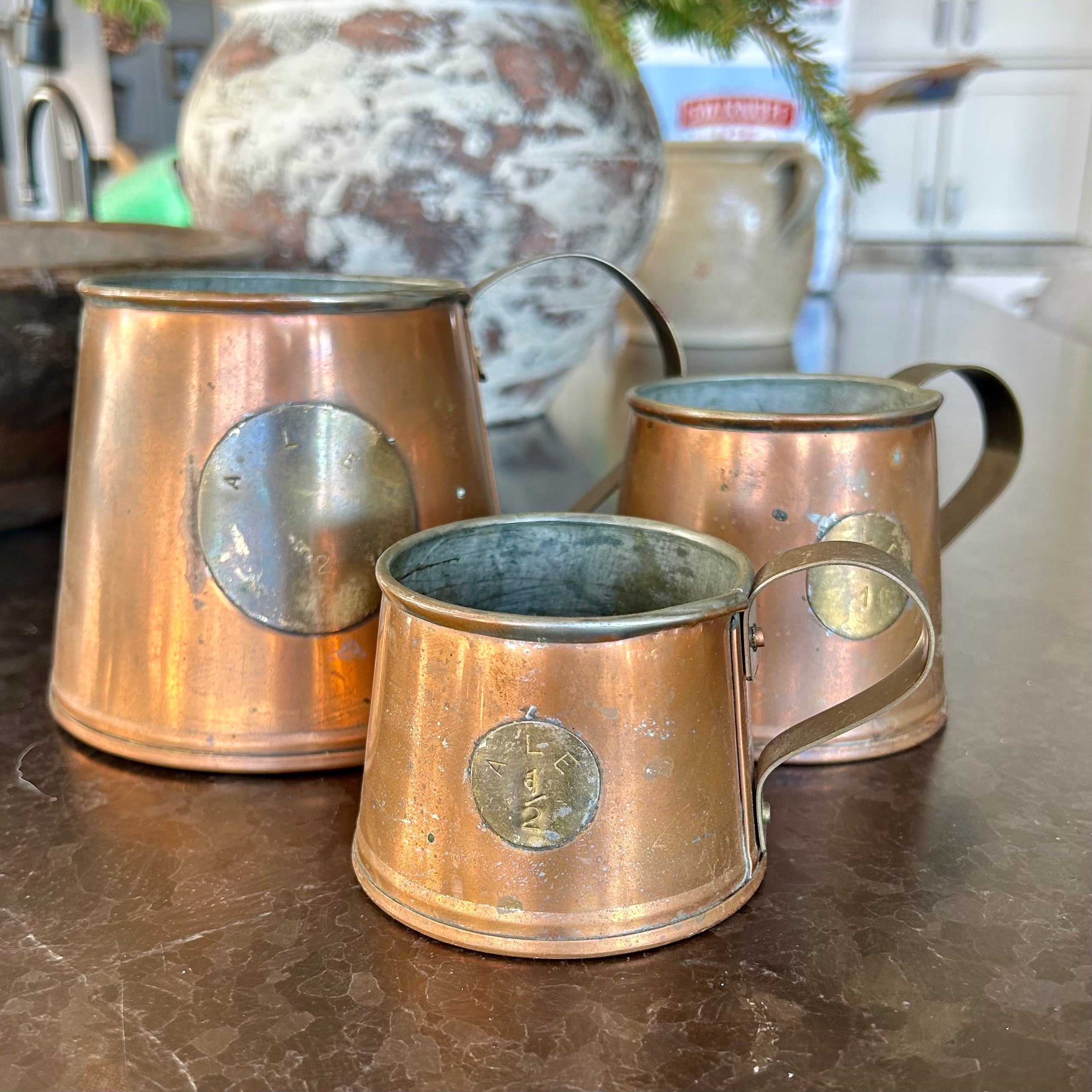Set of Antique Copper Measuring Jugs with Verification Medallions — Graduated Set of Three