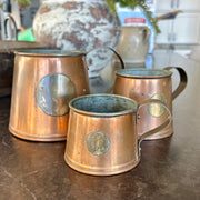 Set of Antique Copper Measuring Jugs with Verification Medallions — Graduated Set of Three