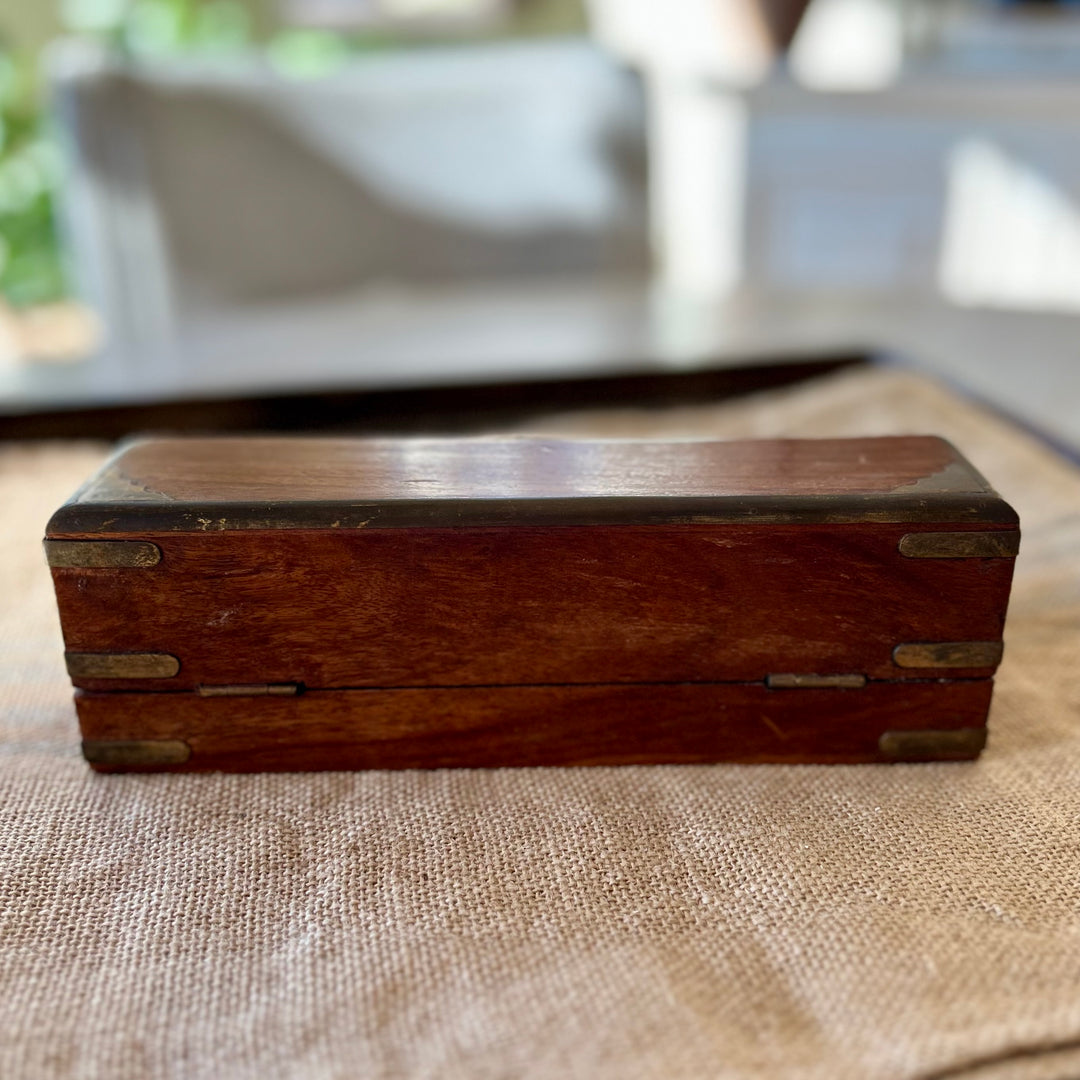 Vintage brass-inlaid wooden box