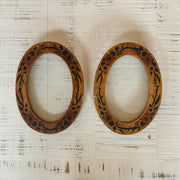 Pair of hand painted wooden oval frames