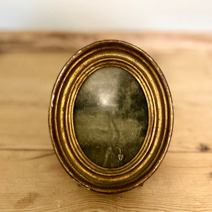Towards the light-  in antique gilt frame