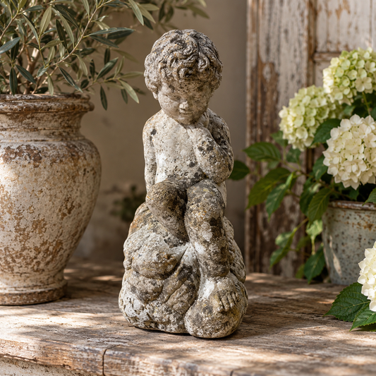 Early 20th Century Weathered Cast Stone Garden Figure
